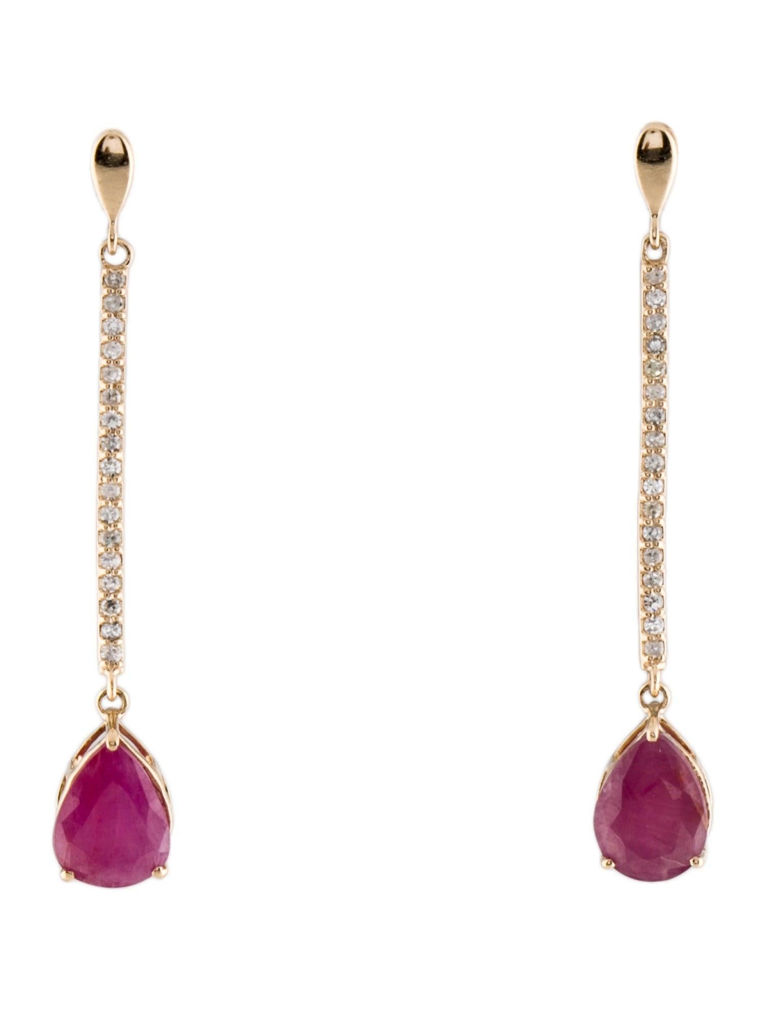Discover the allure of our exquisite 14K Yellow Gold Drop Earrings, featuring a captivating ensemble of rubies and diamonds. These earrings are a harmonious blend of color and sparkle, designed to elevate any look with their refined elegance. At the
