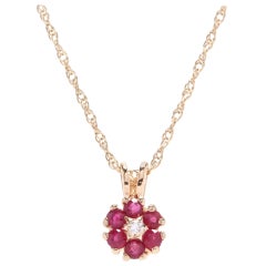 14 Karat Yellow Gold, Ruby, Diamond Flower Pendant Necklace