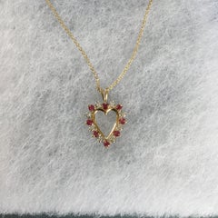 14 Karat Yellow Gold Ruby and Diamond Heart Pendant Necklace