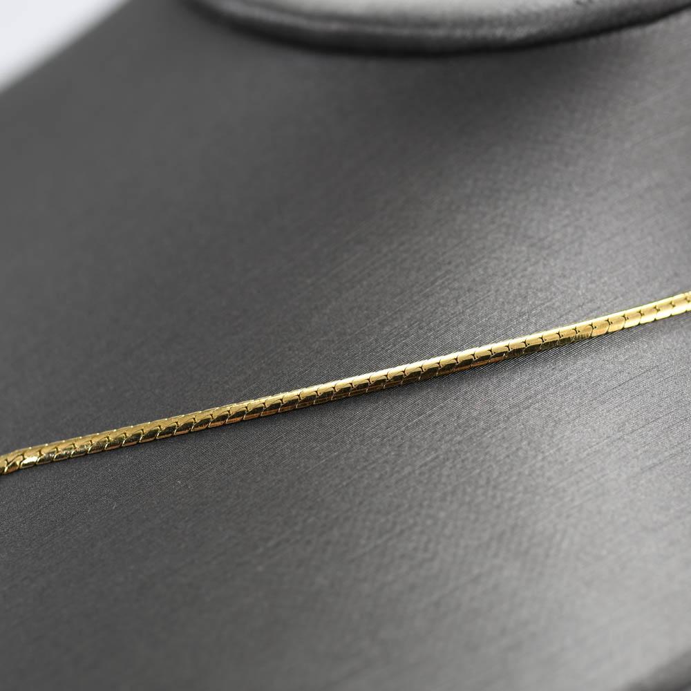 Halskette aus 14 Karat Gelbgold mit Rubin und Diamant .50 Karat Rubin, .50TDW (Tropfenschliff) im Angebot