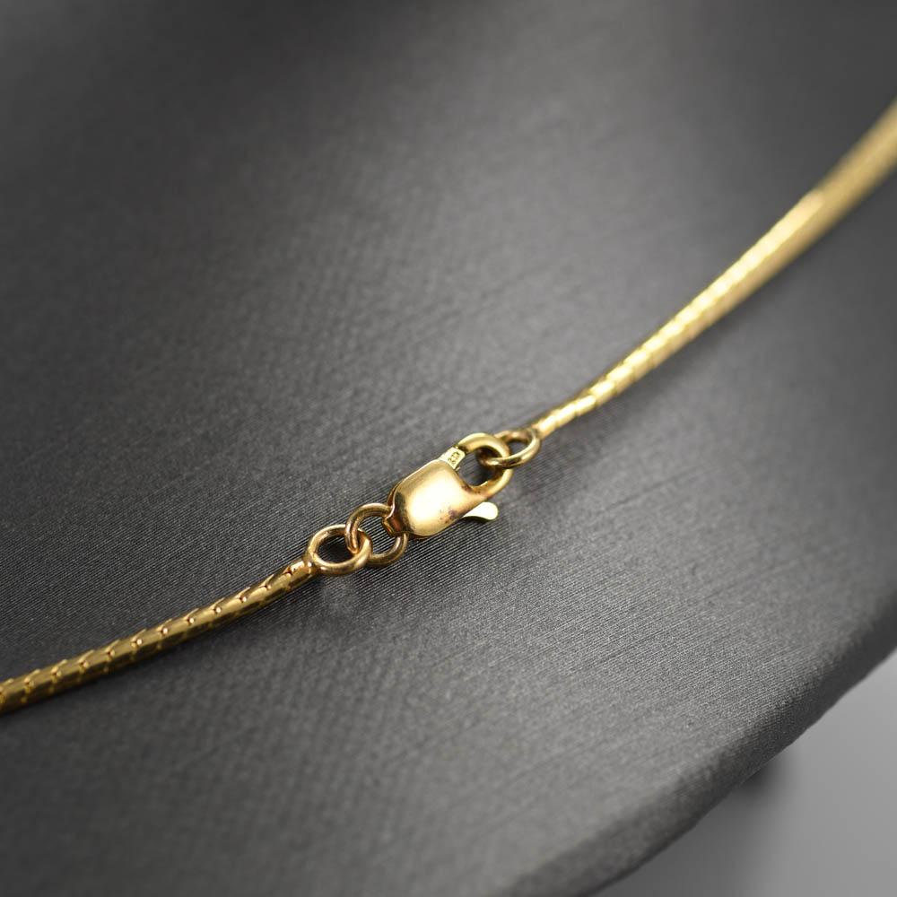 Halskette aus 14 Karat Gelbgold mit Rubin und Diamant .50 Karat Rubin, .50TDW für Damen oder Herren im Angebot