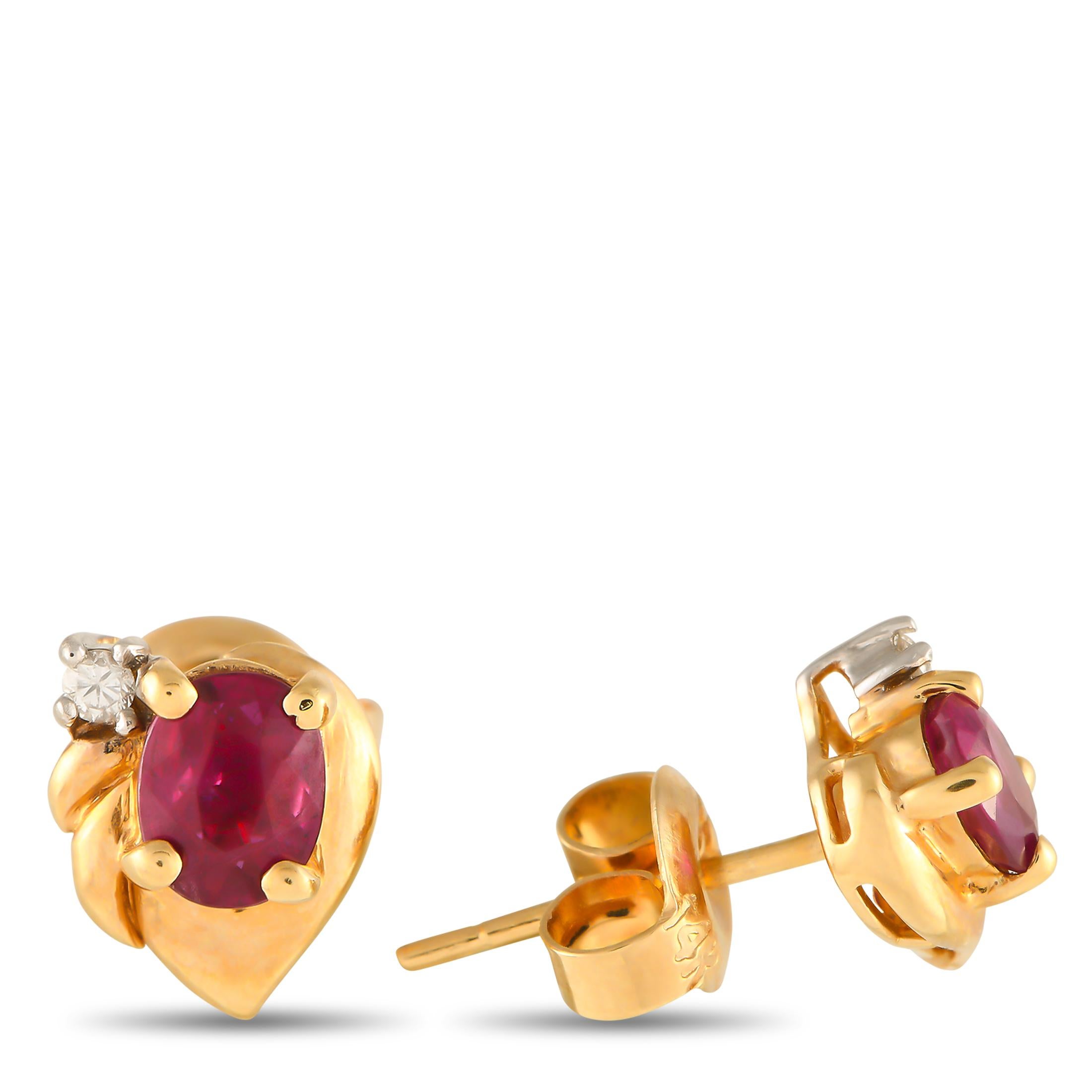 Captivating Ruby gemstones make a statement at the center of these uniquely elegant earrings. Crafted from 14K Yellow Gold, each one measures 0.25 round.This jewelry piece is offered in brand new condition and includes a gift box.
