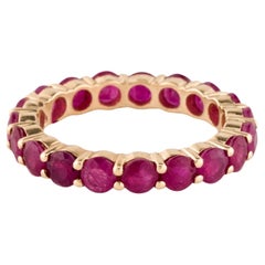 14K Yellow Gold Ruby Eternity Band Featuring 3.70ctw Round Rubies, Size 7.5