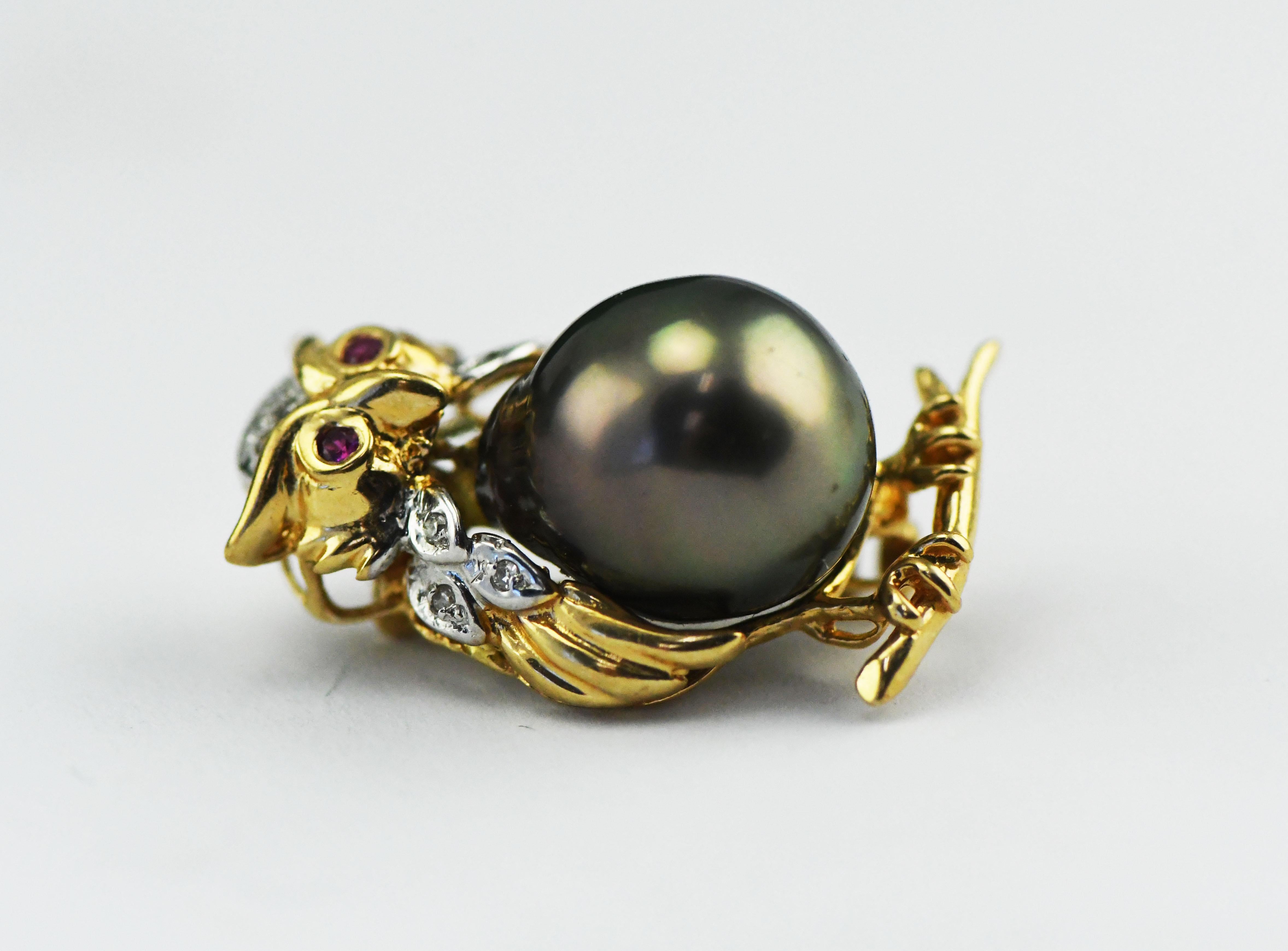 14k Gold Ruby Eyed Horned Owl Pin Pendant with Tahitian South Sea Pearl & Diamond Accents.  
5.9 grams and is about 1