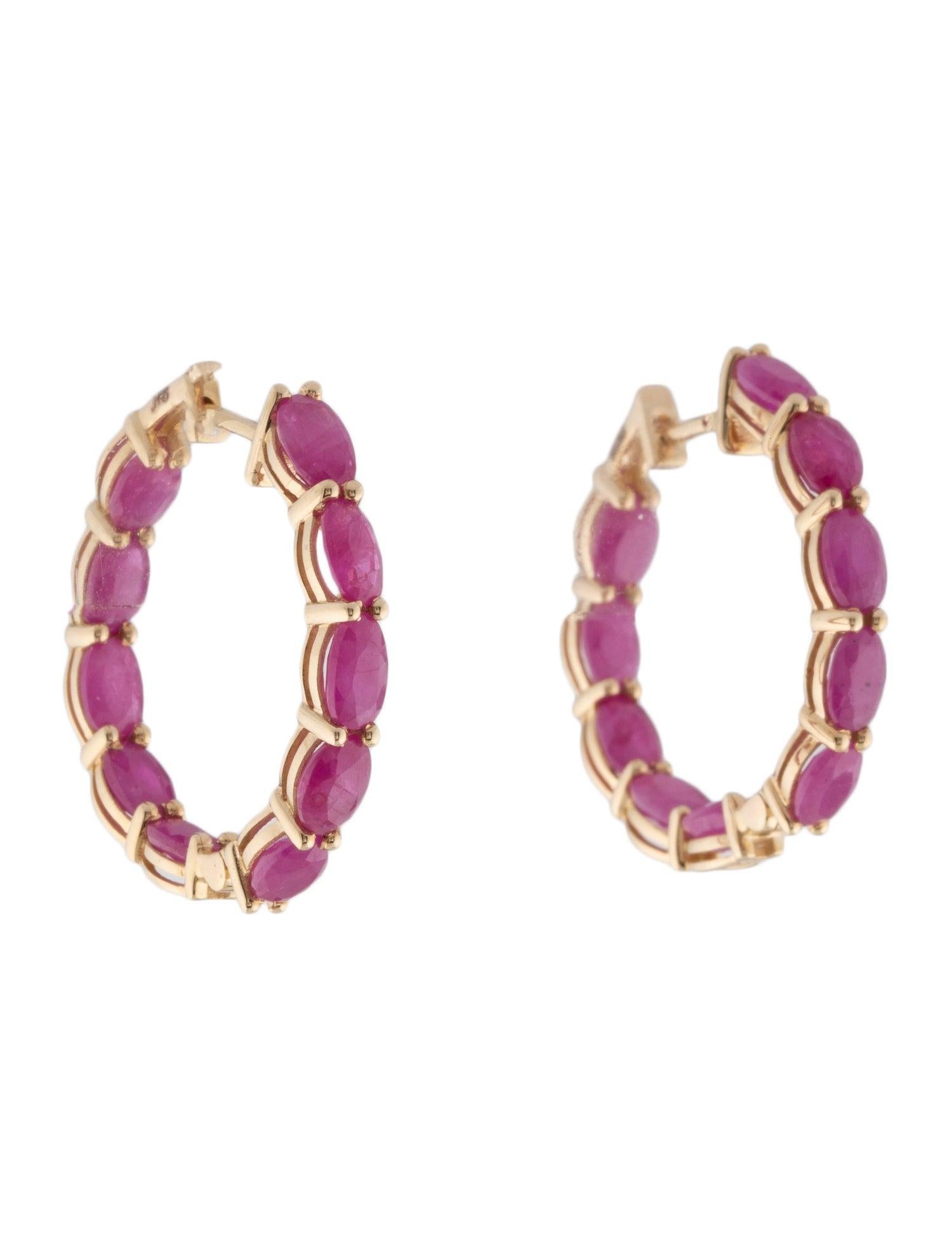 Experience the allure of our 14K Yellow Gold Ruby Inside-Out Hoop Earrings, a captivating addition to any fine jewelry collection. These stunning earrings feature a total carat weight of 6.77 in oval modified brilliant rubies, meticulously set to