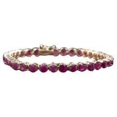 Pulsera de tenis de oro amarillo de 14 quilates con rubíes