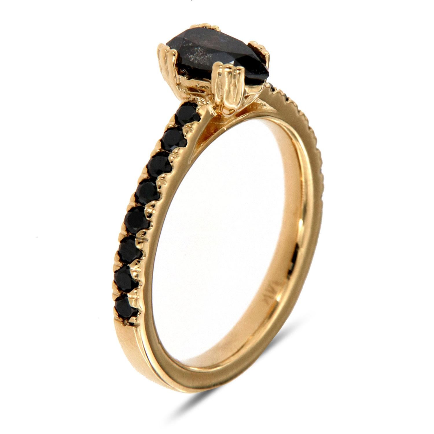This Rustic design ring features sixteen( 16) Round shaped Black diamonds set alongside of a 1.7 MM wide band. In the center of the ring is set 3/4 carat Salt and Pepper placed in twelve (12) delicate prongs to enhance its rustic appeal. Experience