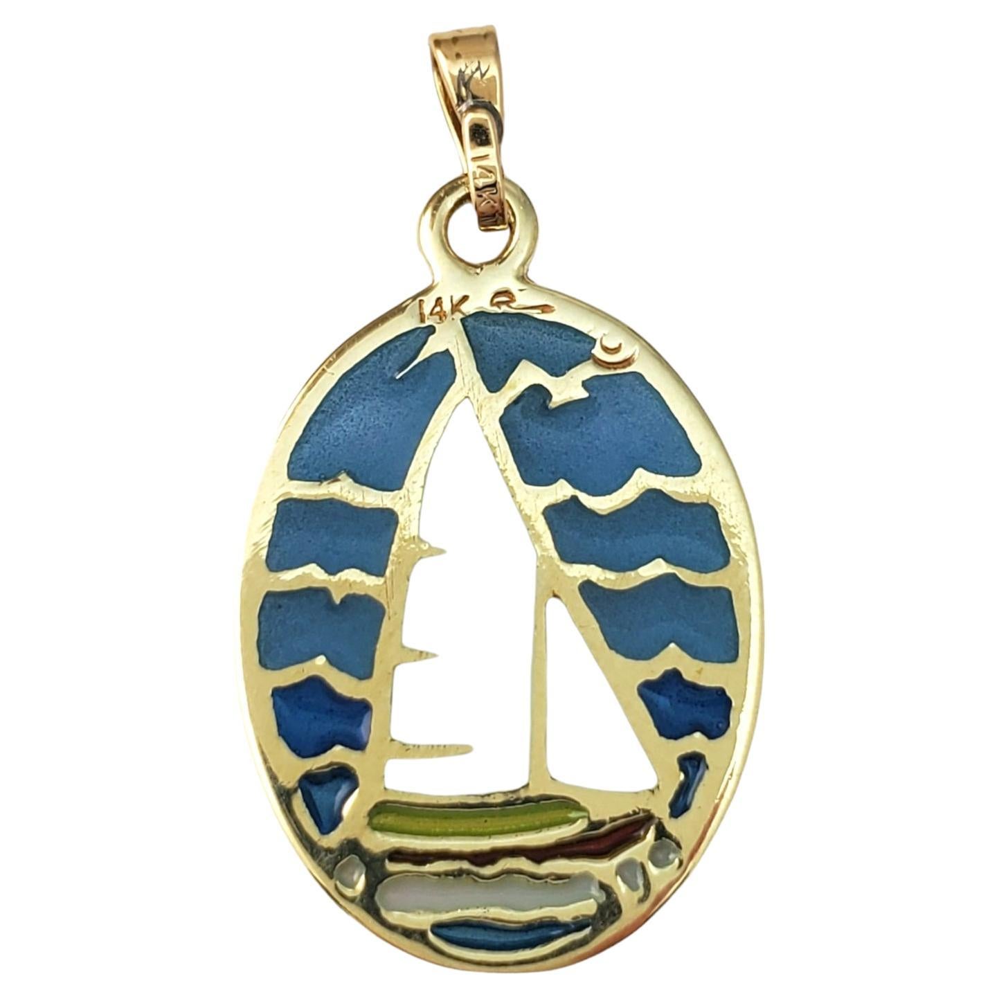 Vintage 14K Yellow Gold Sailboat Pendant-

This gorgeous pendant features a display of a sailboat on the open ocean. 

Size:  22.6 mm  x  14.8 mm X 1.0 mm 

Weight:  1.1 dwt./  1.8 gr.

Stamped:  14K

Will come packaged in a gift box or pouch (when