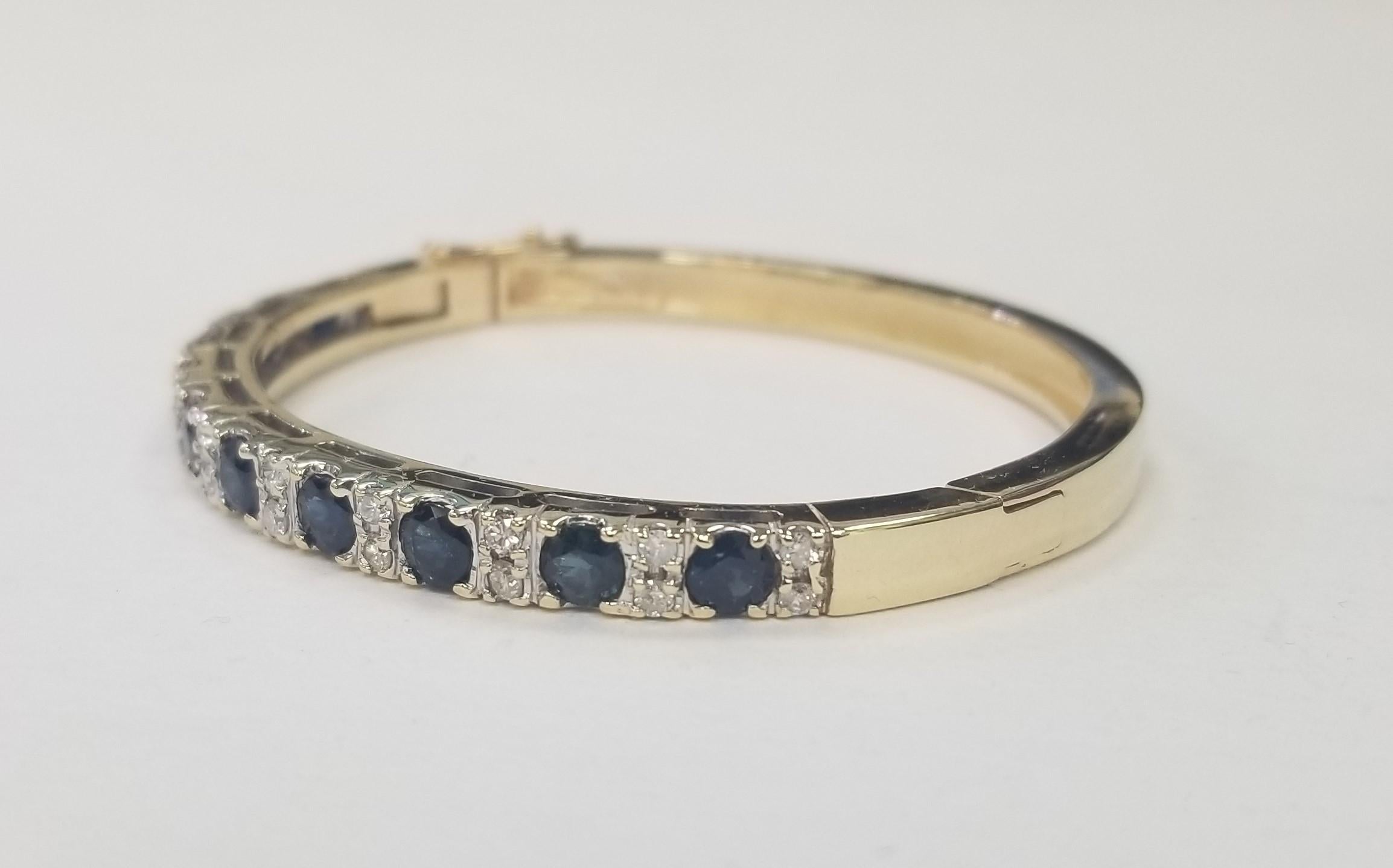 DIAMOND TENNIS BRACELET 
Specifications:
*Motivated to Sell - Please make a Fair Offer*
    main stone: 10 Round Sapphires 3.50cts.
    diamonds: 22 round Diamonds 
    weight: .50pts.
    color: H
    clarity: VS2-SI1
    metal:  14K gold
    type: