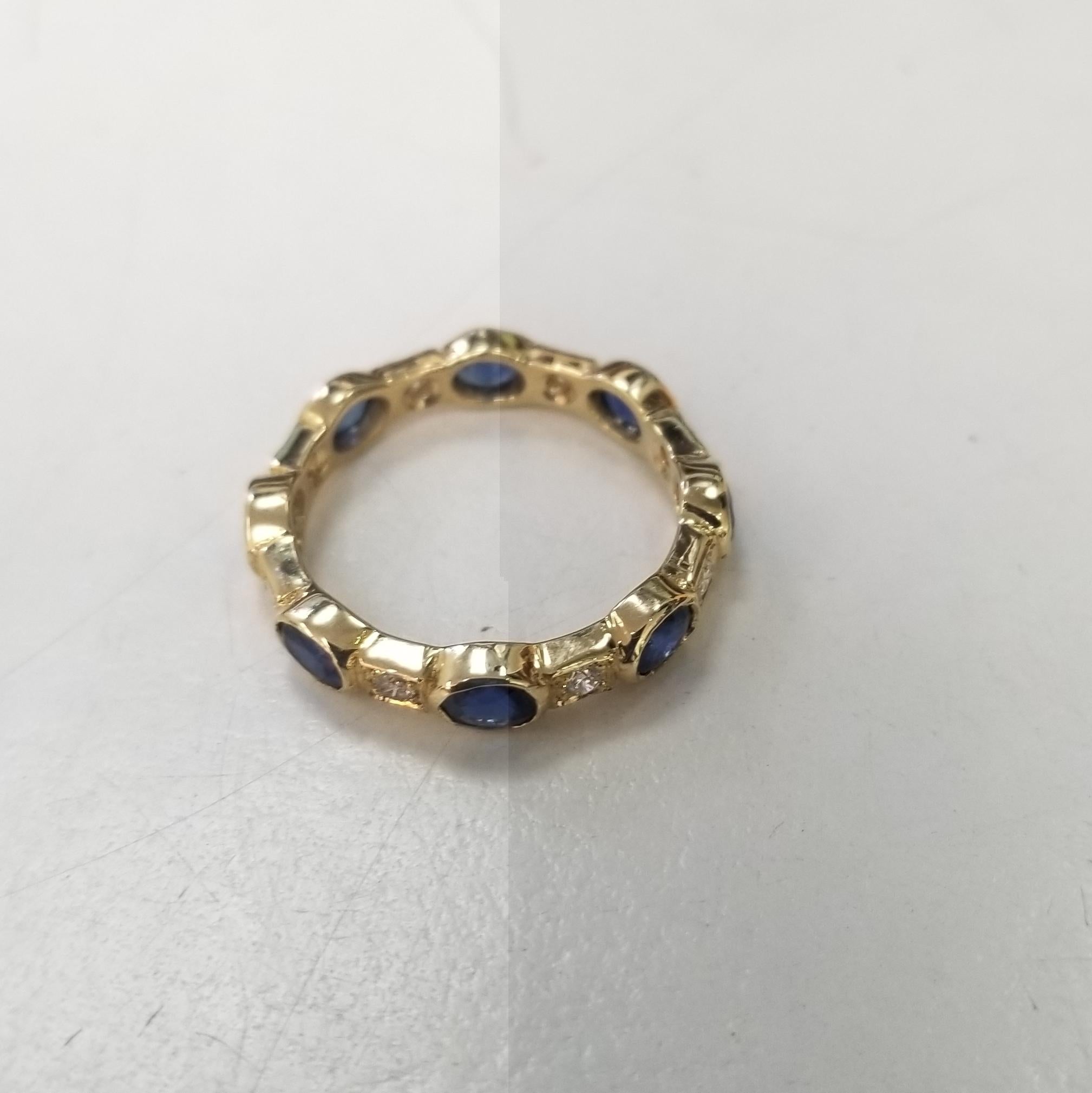 Beautiful sapphire and diamond ring.
Specifications:
    main stone: 8 Marquise Sapphires 1.78 cts. 
    diamond; 8 diamonds weighing approx. .20 cts.
    diamond; clarity: VS
    diamond; color: G
    metal:14k yellow gold
    type:ring 
    weight