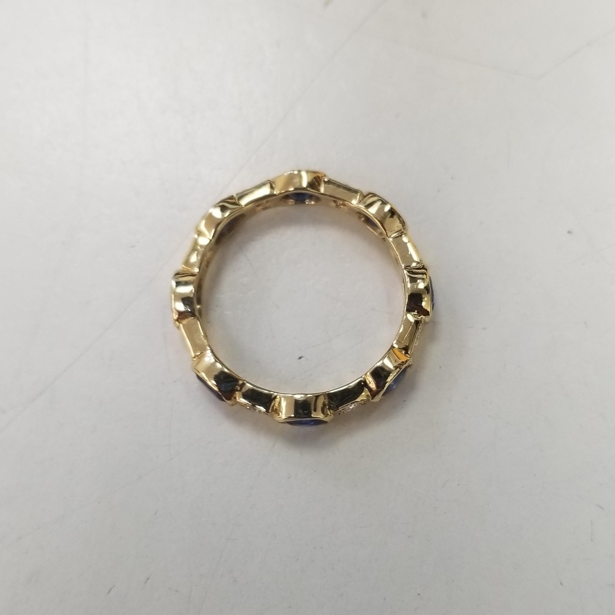 Contemporary 14k Yellow Gold Sapphire and Diamond Bezel Set Eternity Ring For Sale