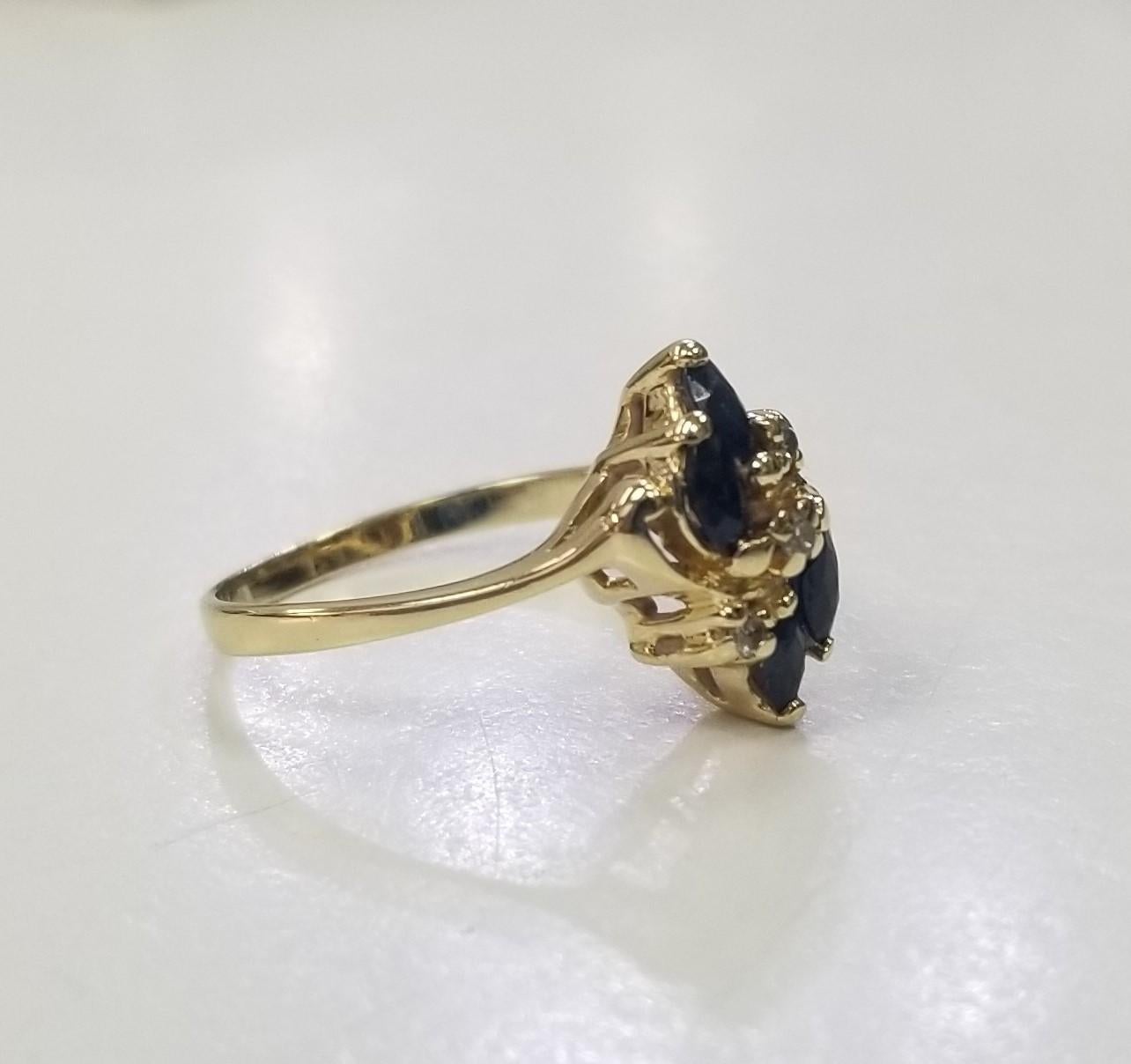 Specifications:
    main stone: 4marquise sapphires .25pts.
    other stones: 3 round diamonds .06pts.    
    color:GH
    clarity:SI1
    brand:-  metal:14K GOLD
    type: ring
    weight:2.8Gr
    size: 6.75 US



