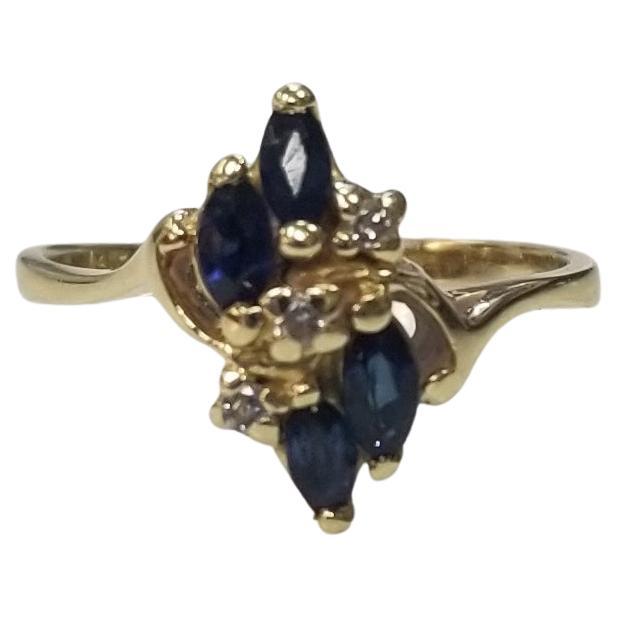 14k Yellow Gold Sapphire and Diamond Cluster Ring For Sale
