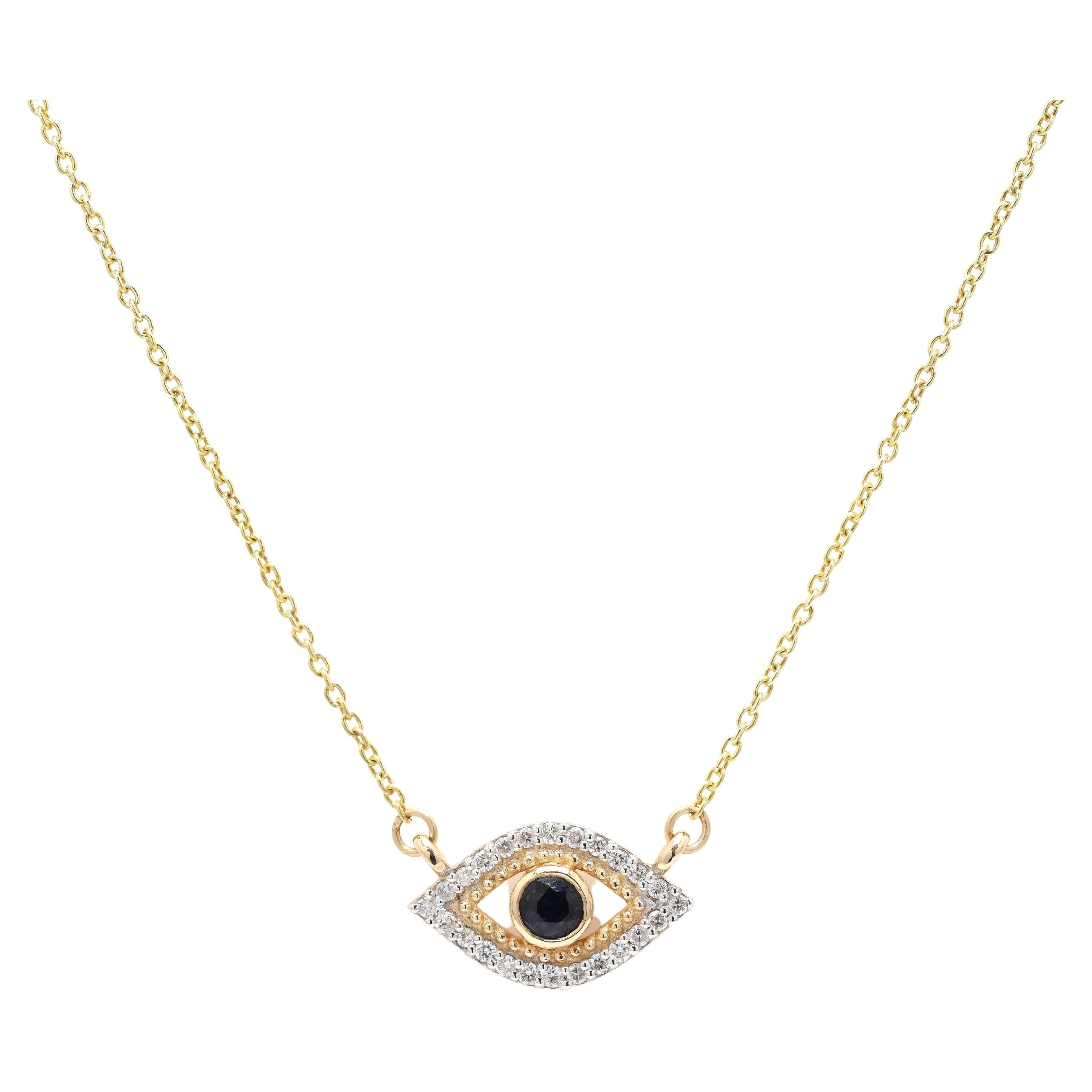 Collier Evil Eye en or jaune 14 carats avec saphir bleu et diamants, mettant en valeur le collier