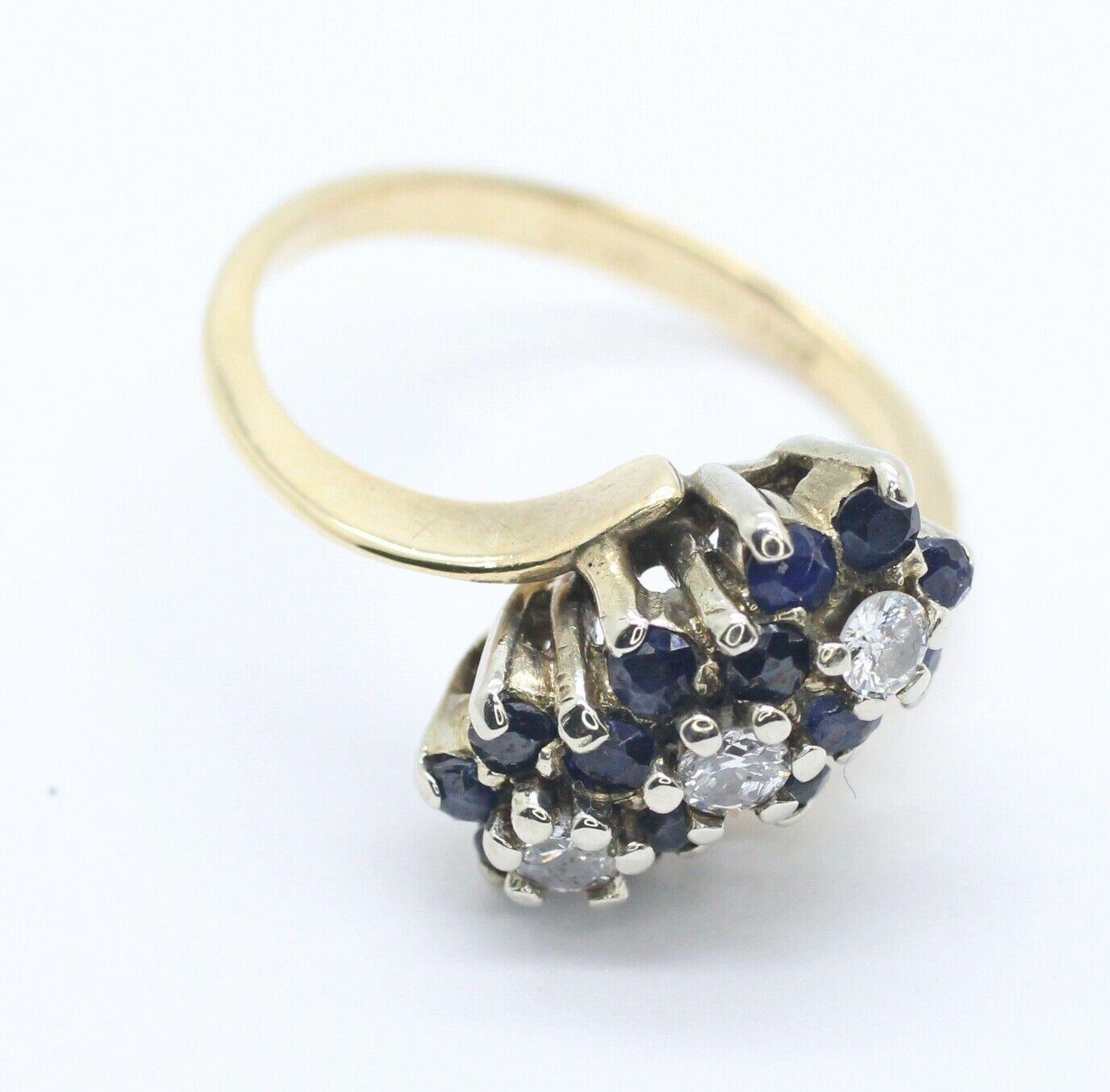  Specifications:
    main stone: 3 PCS ROUND CUT DIAMOND APPRX 0.20CTW
    GEMSTONE: 14 PCS ROUND BLUE  SAPPHIRE 1.6MM
    carat total weight: APPROXIMATELY 0.20CTW
    color: G
    clarity: VS2
    brand: UNBRANDED
    metal: 14K YELLOW GOLD
   