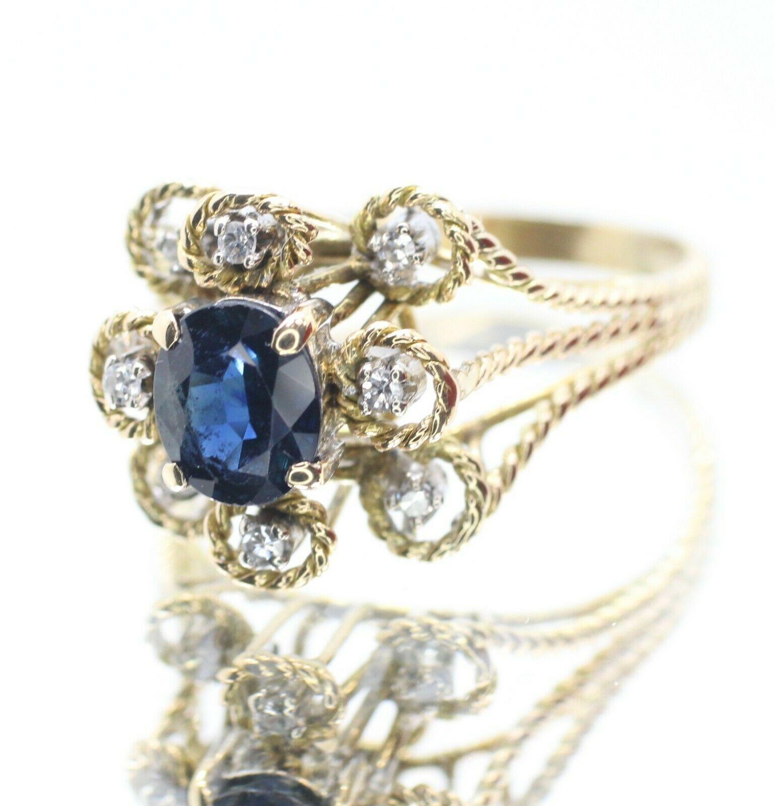  Beautiful vintage cluster ring. This ring features a oval cut blue sapphire in approximately 6.73 x 5.67 mm with 8 pcs round cut diamond in approximately 0.06 carat total weight.The current size of the ring is 8.75US.
Specifications:
    main