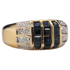 Ring aus 14 Karat Gelbgold mit Saphir und Diamant
