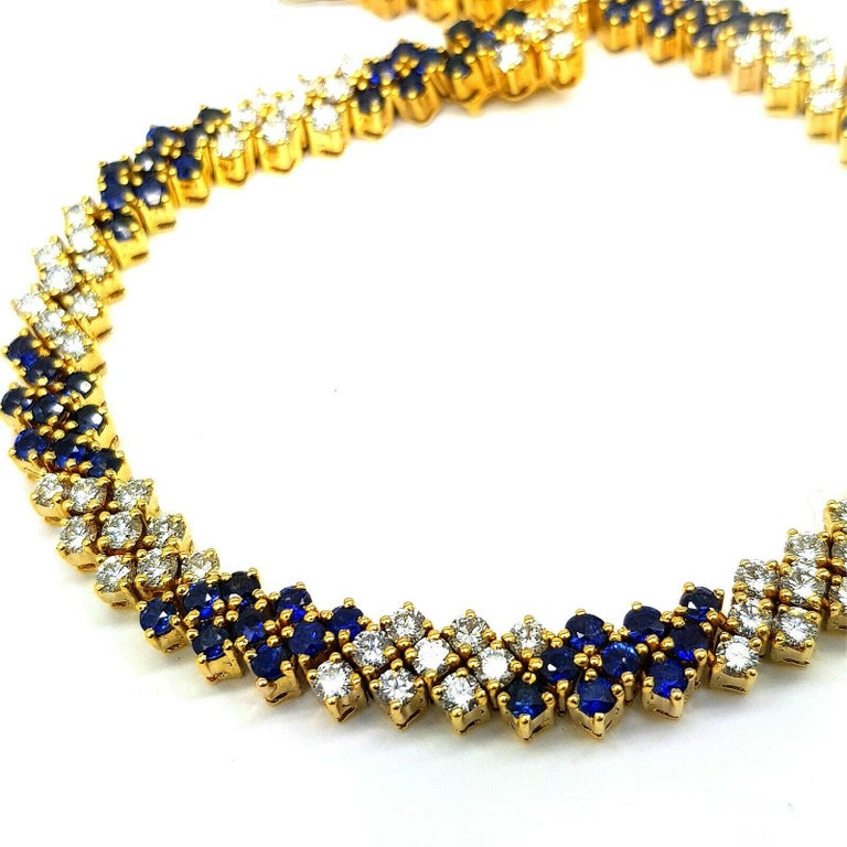  A beautiful blue sapphire and diamond wide mesh bracelet.This bracelet features 76 pieces of diamond in approximately 3.50 carat total weight, G color and VS1 in clarity and has 78 pieces of blue sapphire crafted in 14K yellow