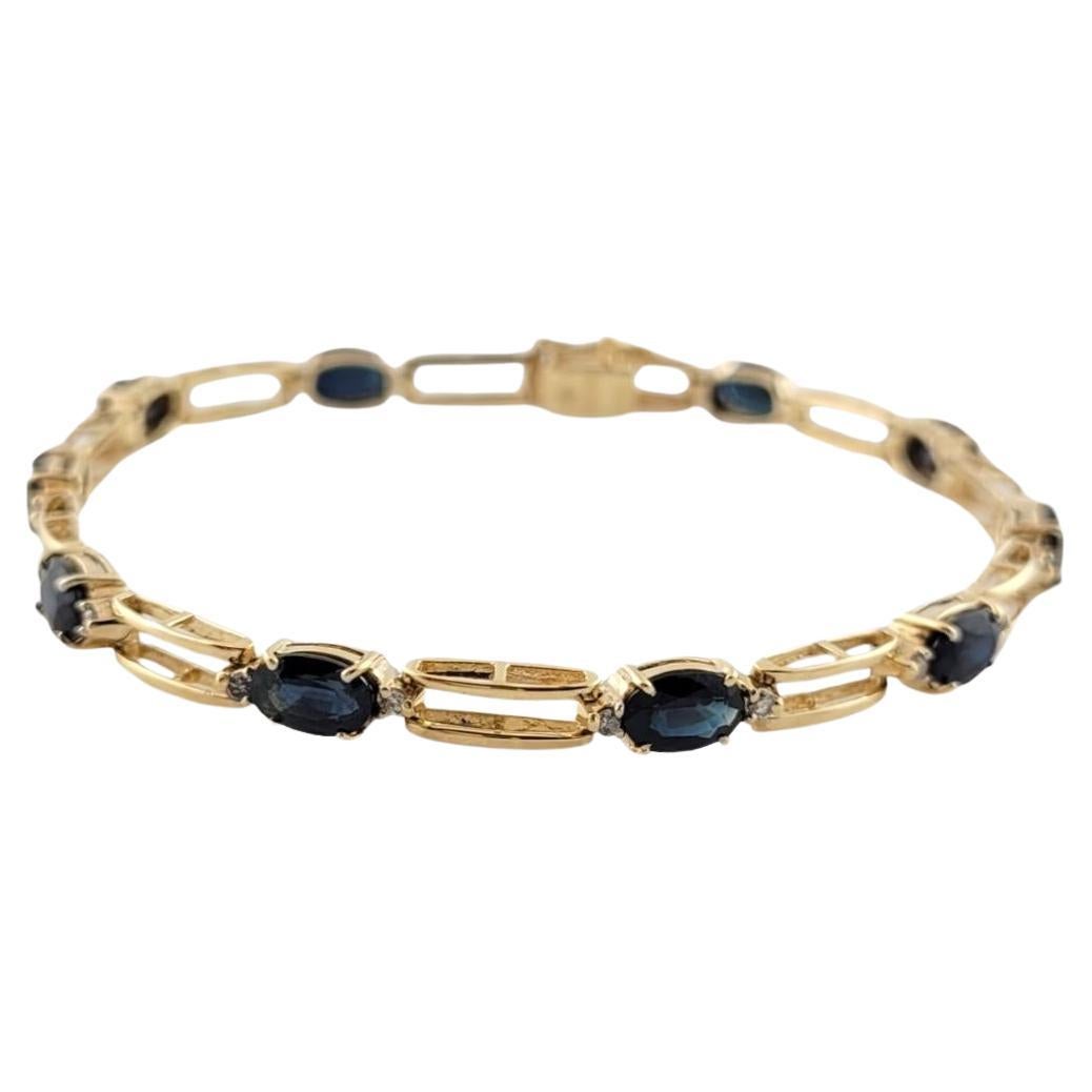 Armband aus 14 Karat Gelbgold mit Saphiren und Diamanten #15886