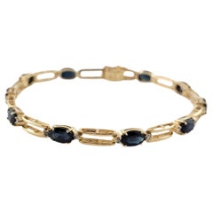 Armband aus 14 Karat Gelbgold mit Saphiren und Diamanten #15886