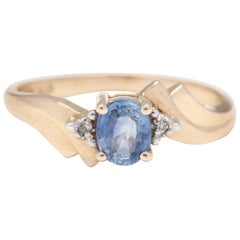 14 Karat Yellow Gold, Sapphire, Diamond Bypass Ring