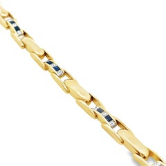 Bracelet chaîne en or jaune 14 carats, saphirs et diamants