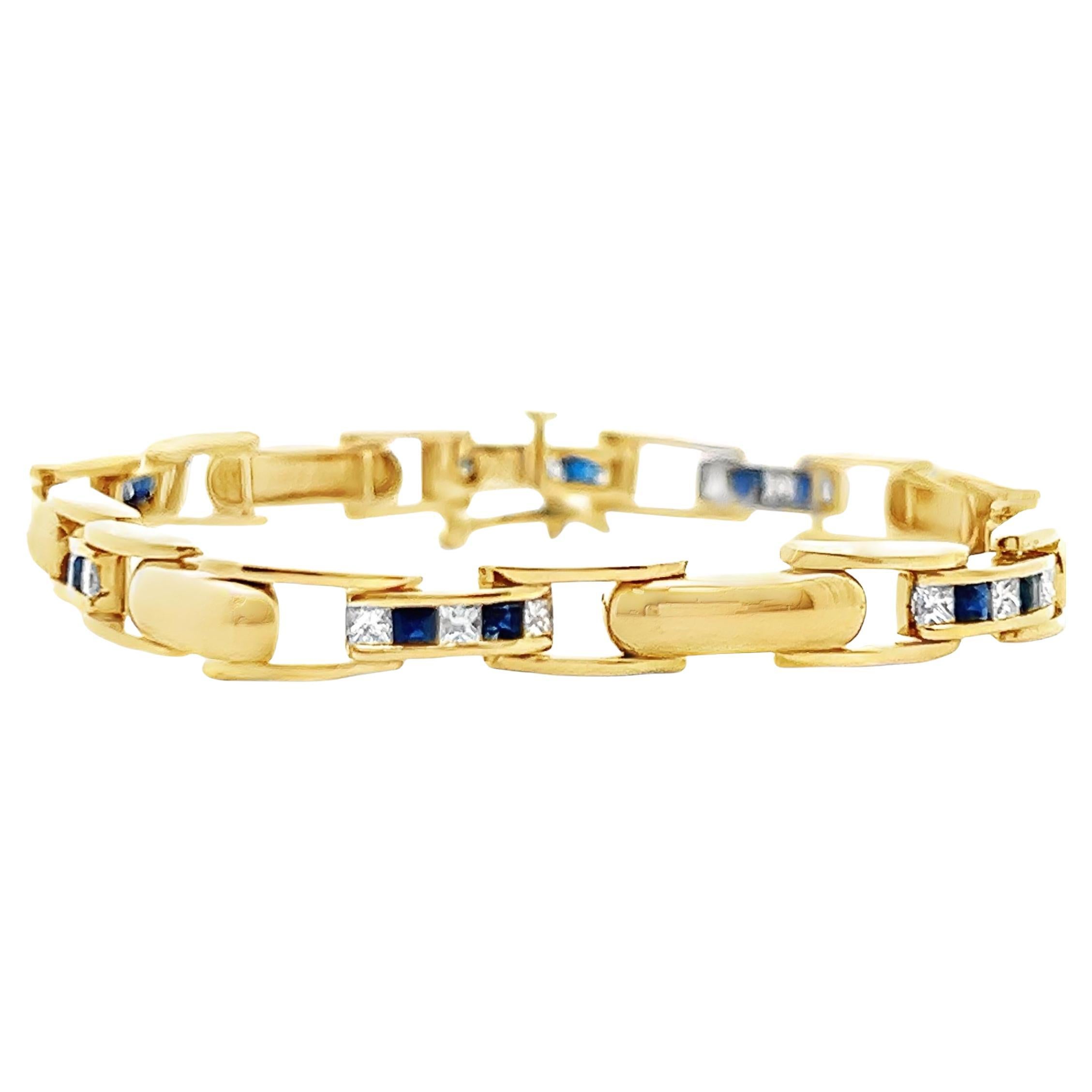 Kettenarmband aus 14k Gelbgold mit Saphiren und Diamanten