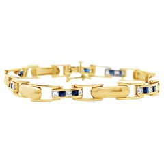 Kettenarmband aus 14k Gelbgold mit Saphiren und Diamanten