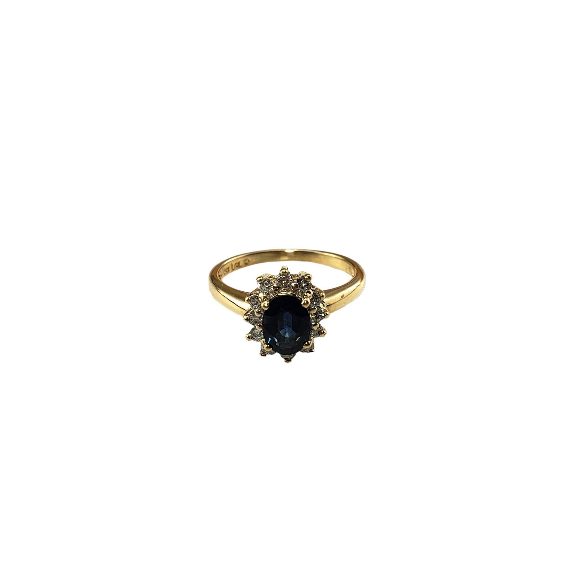 Vintage 14 Karat Yellow Gold Sapphire and Diamond Ring Size 5.25 JAGi Certified-

This elegant ring features one oval blue sapphire surrounded by 12 round brilliant cut diamonds set in classic 14K yellow gold.  Width:  11 mm.  Shank: 2 mm.

Sapphire