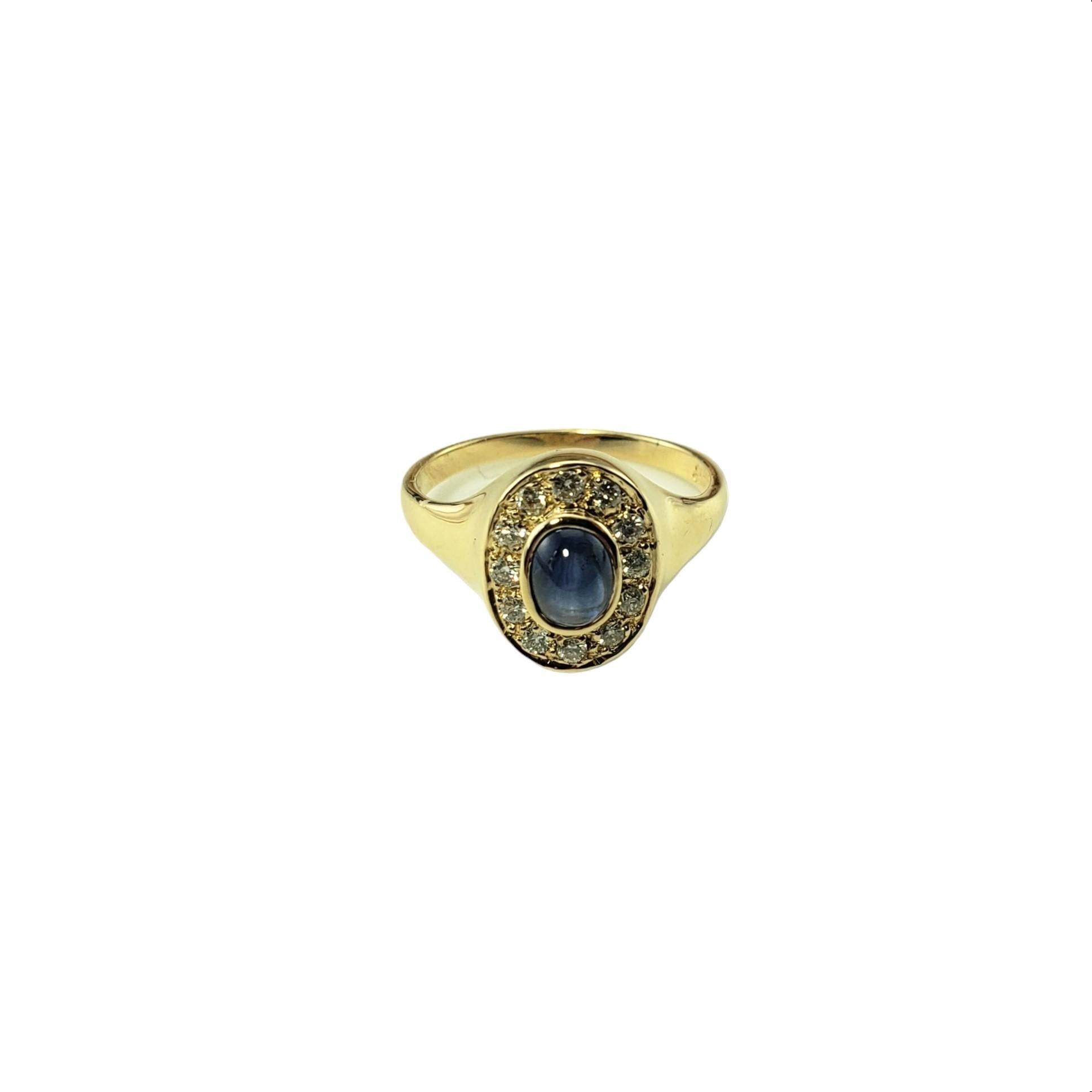 Vintage 14 Karat Yellow Gold Sapphire and Diamond Ring Size 6.25 JAGi Certified-

This elegant ring features one oval blue cabochon sapphire and 12 round brilliant cut diamonds set in classic 14K yellow gold.  Width: 12 mm.  Shank: 1.7 mm.

Sapphire