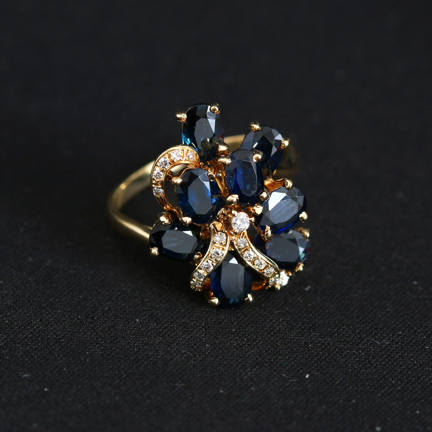 14K Yellow Gold Sapphire & Diamond Ring Size 8.25 - Beautiful flower shaped ring with eight Sapphires and diamonds. Total carat weigh 2.56. Size 8.25 and can be sized .