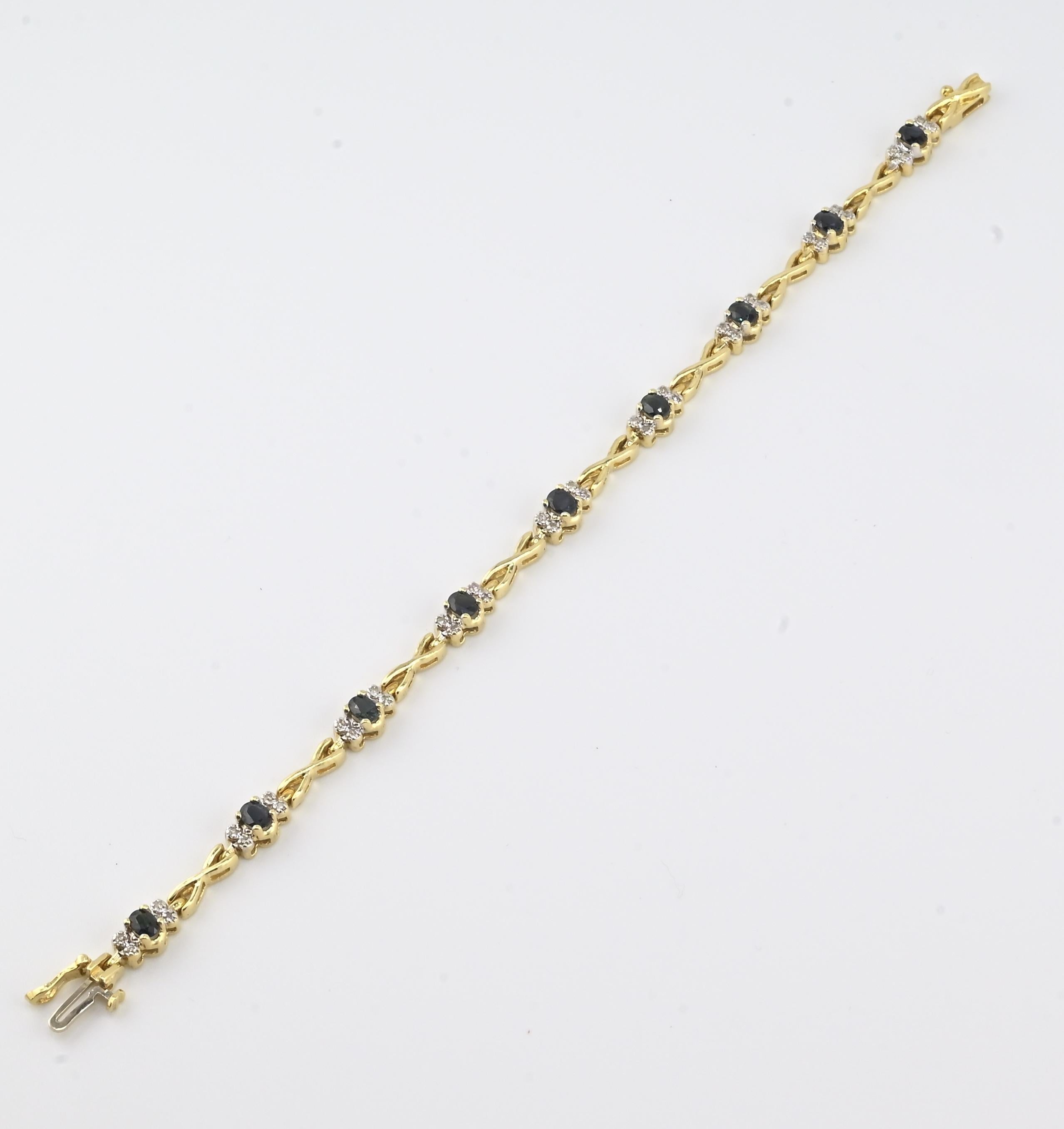 Bracelet de tennis en or jaune 14K avec saphir et diamant • 11.29g • Saphirs naturels en vente 1