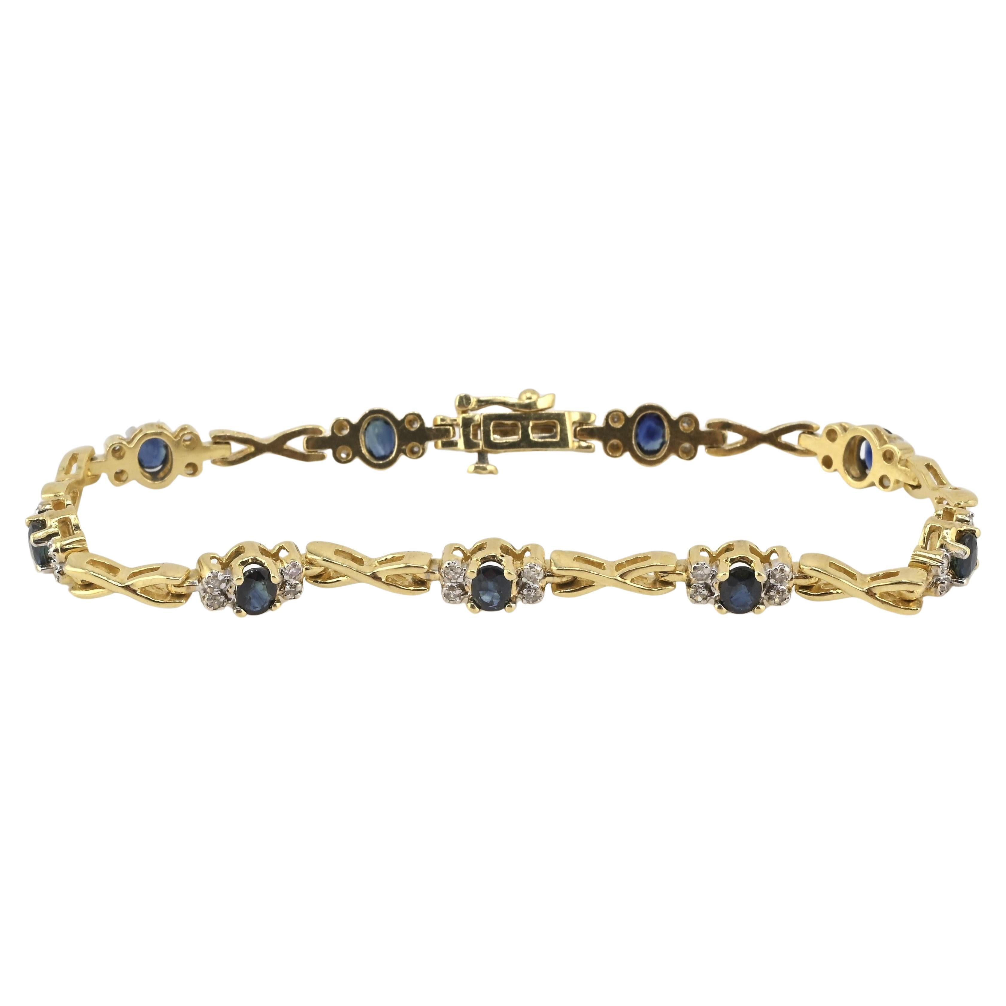Bracelet de tennis en or jaune 14K avec saphir et diamant • 11.29g • Saphirs naturels en vente