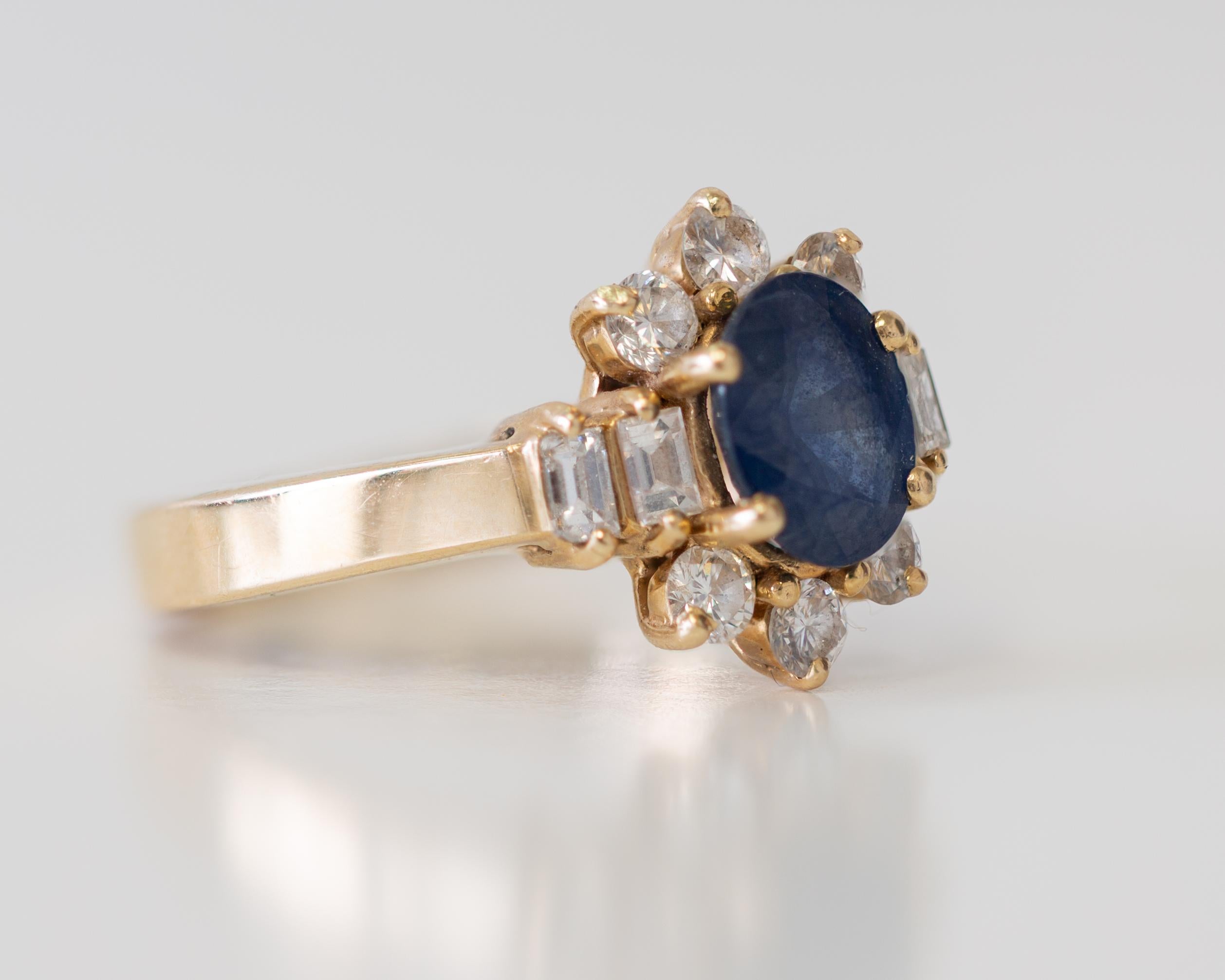 Oval Cut 14 Karat Yellow Gold Sapphire and Diamonds Ring For Sale