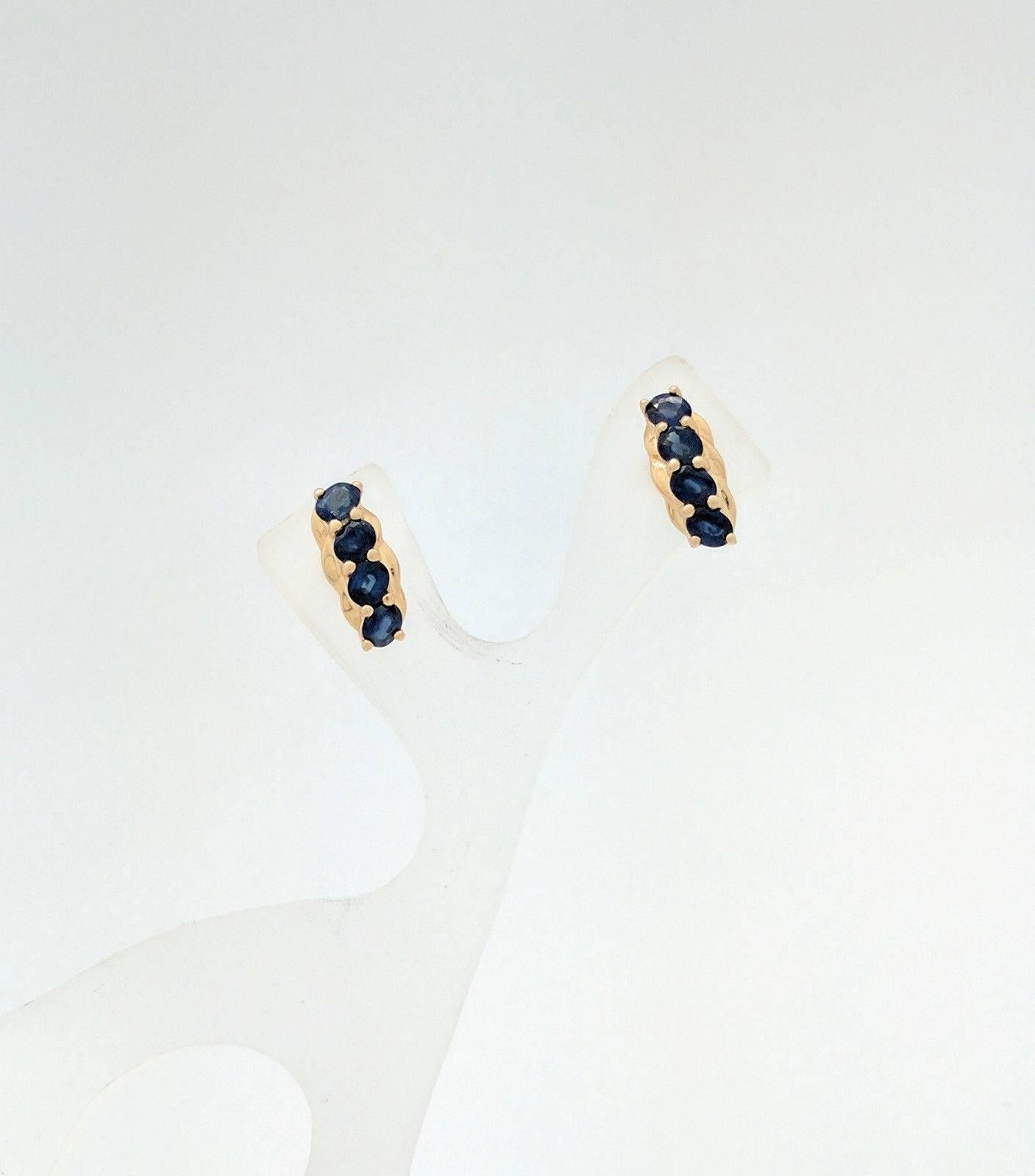 Ladies 14K Yellow Gold Sapphire Earrings 2.6 Grams 2ctw

You are viewing a beautiful pair of ladies sapphire earrings. These earrings are crafted from 14k yellow gold and weigh 2.7 grams. They measures 14mm in length and 6mm in width. Each earring