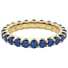 14K Yellow Gold Sapphire Eternal Fit Eternity Band Features 2.65 Carat of Blue