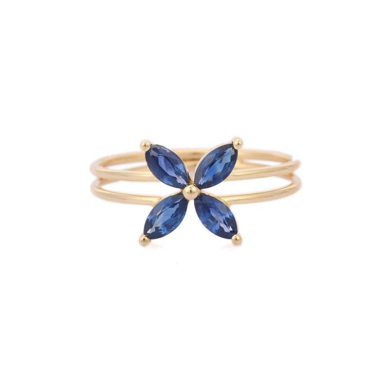 Minimal Blue Sapphire Flower Ring in 14K Gold featuring natural sapphire of 0.48 carats. The gorgeous handcrafted ring goes with every style.
Sapphire stimulate concentration and reduces stress.
Designed with four marquise cut sapphire petal flower