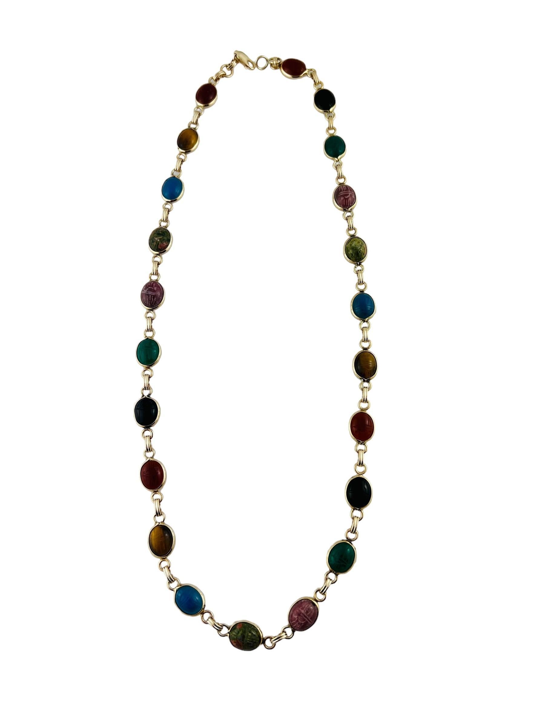 14K Yellow Gold Scarab Necklace 

This beautiful scarab necklace is set in 14K yellow gold and is set with blue, pink, green, red, black and yellow scarab stones

20