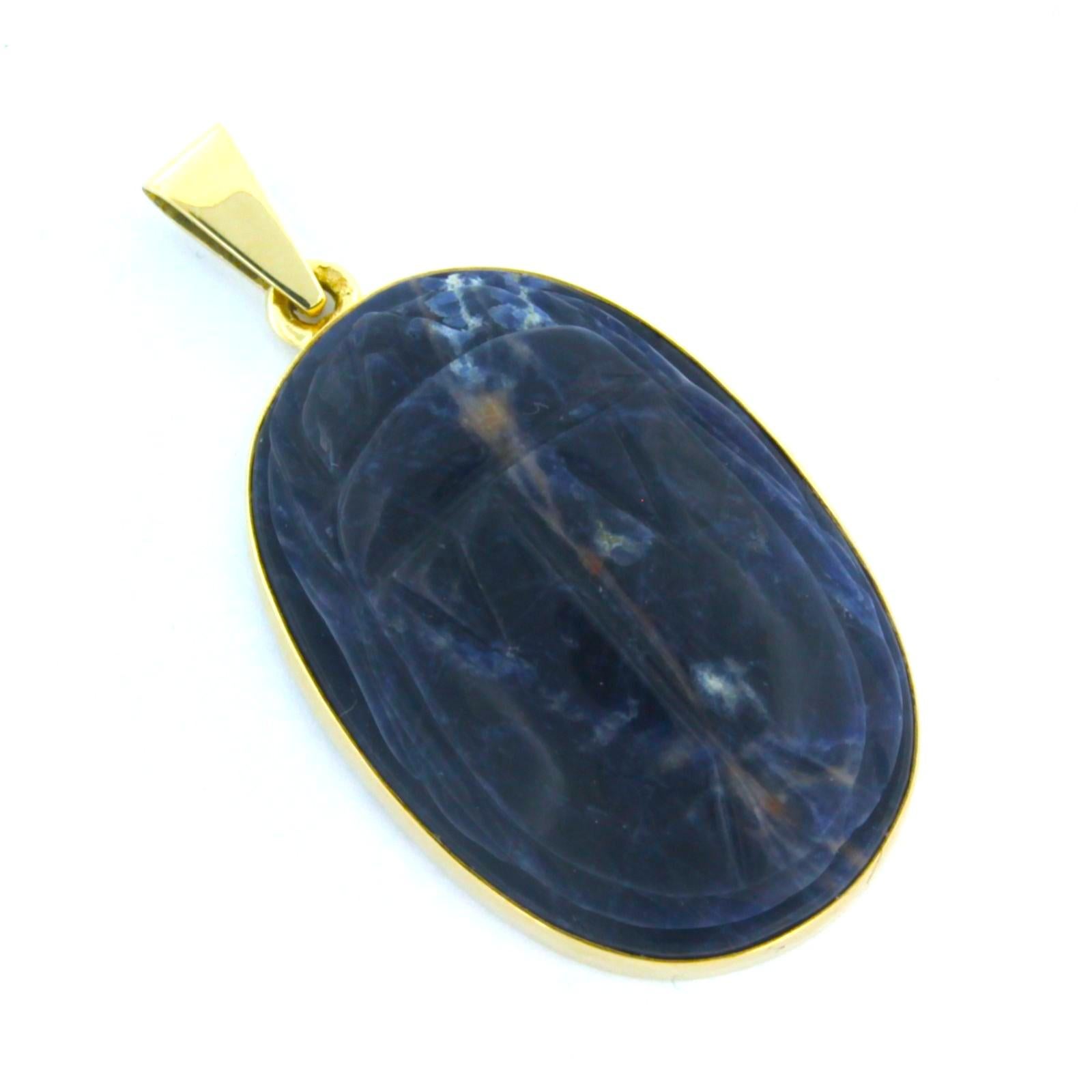 Pendentif scarabée en or jaune 14k avec labradorite

Description détaillée :

Le pendentif mesure 4,2 cm de haut, 2,2 cm de large et 1,2 cm de profondeur.

Poids total 10,2 grammes

set avec

- 1 x 2,9 cm x 1,9 cm labradorite taillée en forme de