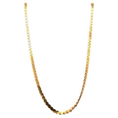 Collana con catena a serpentina in oro giallo 14k