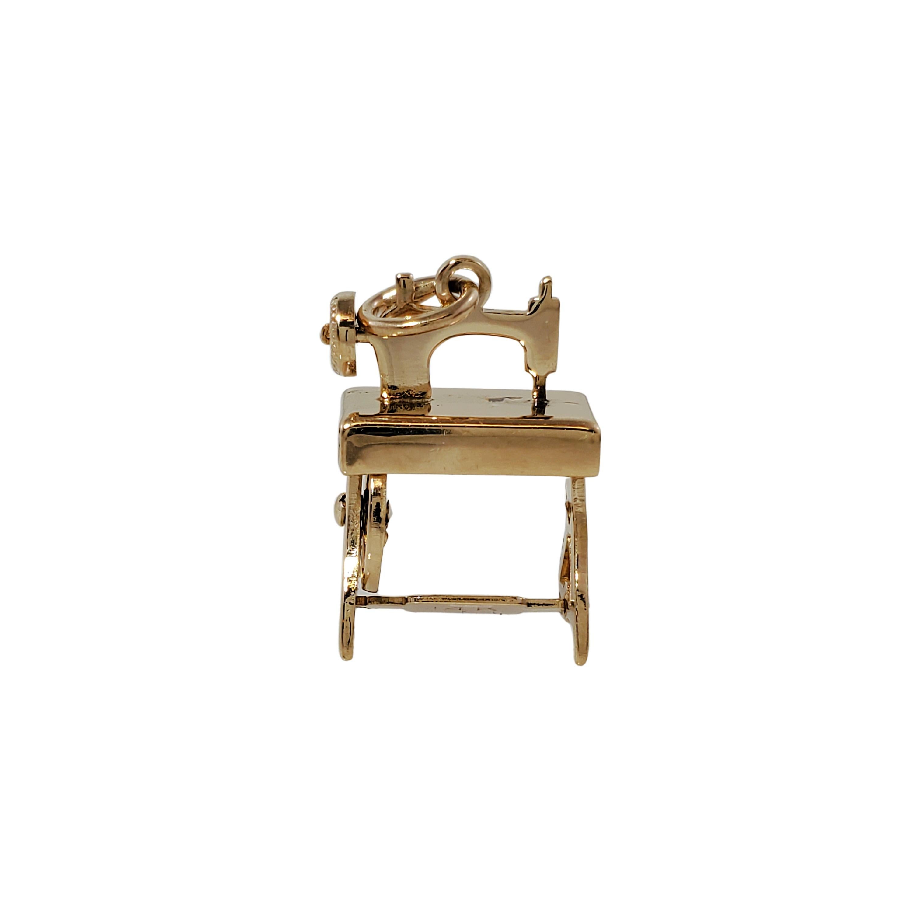 golden sewing machine logo