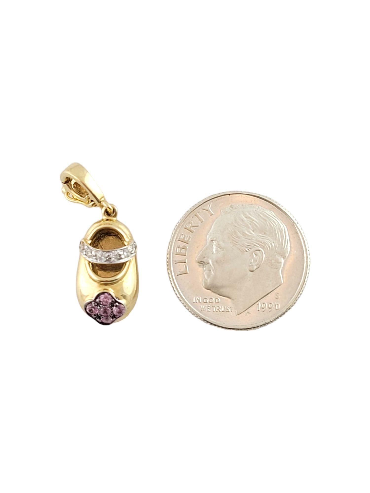 Vintage 14K Yellow Gold Shoe Charm w/ Diamonds & Purple Stones

This adorable 14K gold shoe charm has 5 beautiful purple stones as well as 6 sparkling, round brilliant cut diamonds to represent the strap!

Diamond weight: .05 cts

Diamond clarity: