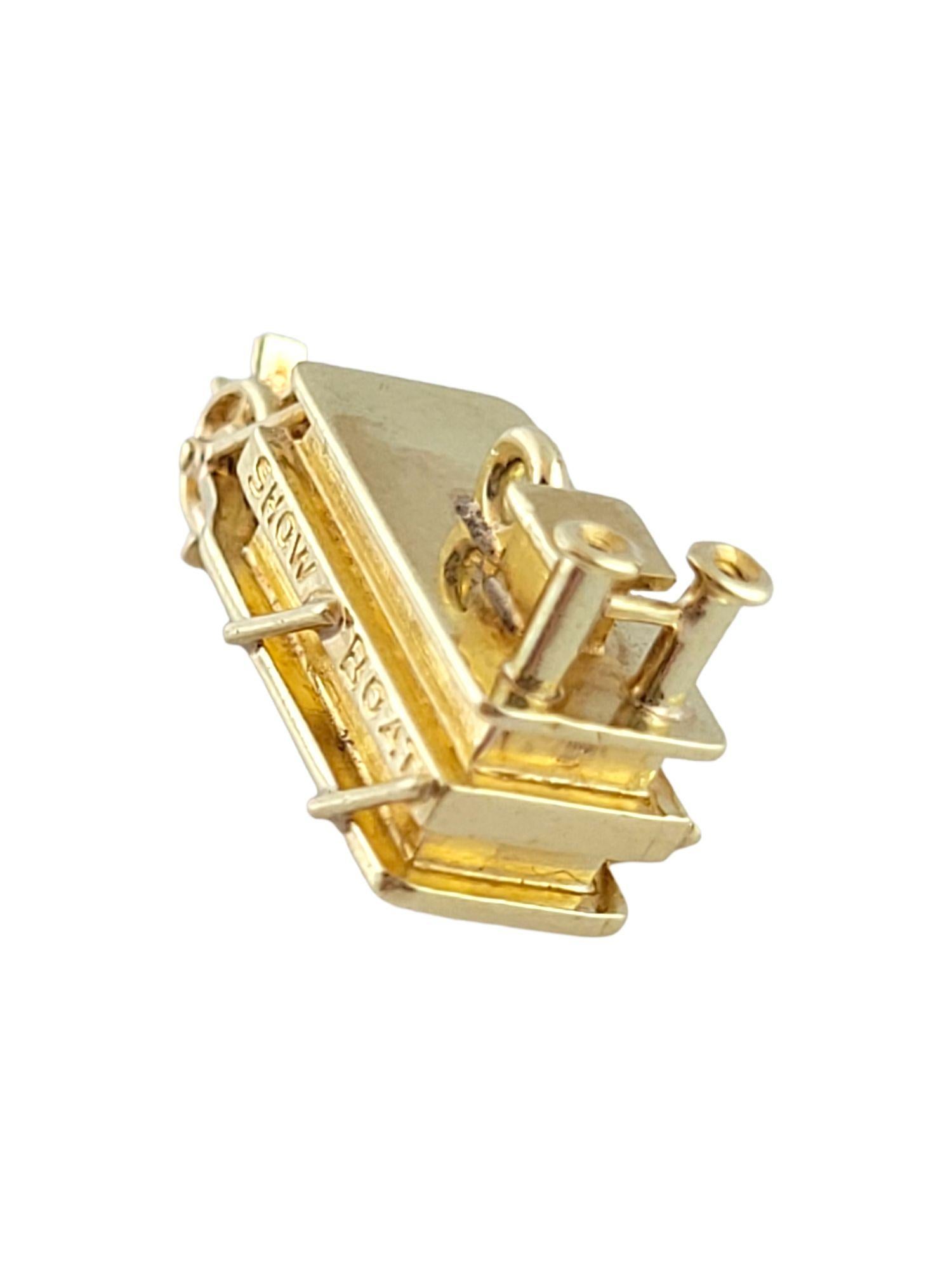 This adorable show boat charm is crafted from 14K yellow gold!

Size: 10.9mm X 18.9mm X 7mm

Weight: 2.78 g/ 1.7 dwt

Hallmark: 14K

Very good condition, professionally polished.

Will come packaged in a gift box or pouch (when possible) and will be