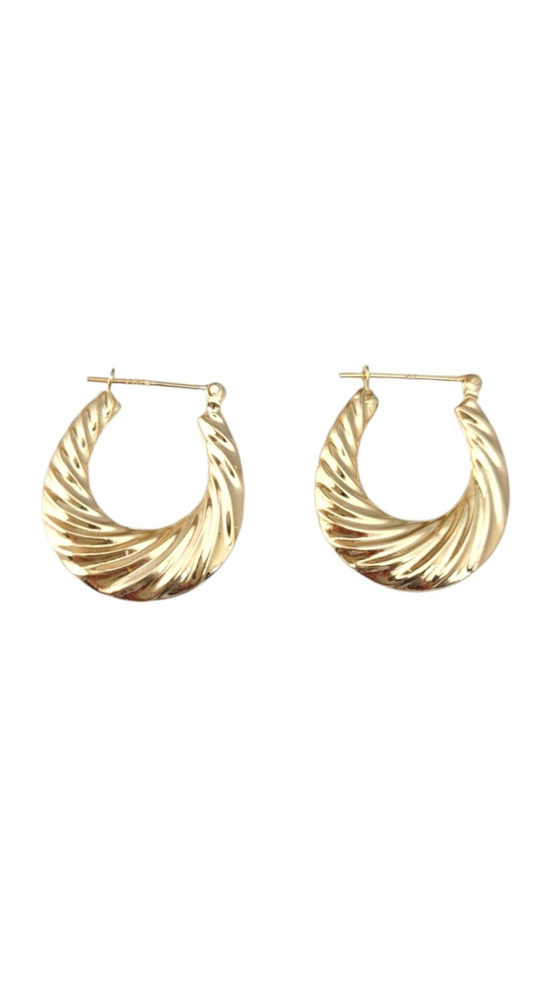 14K Yellow Gold Shrimp Hoop Earrings -

These shrimp earrings showcase a distinctive, ridged design reminiscent of the classic 