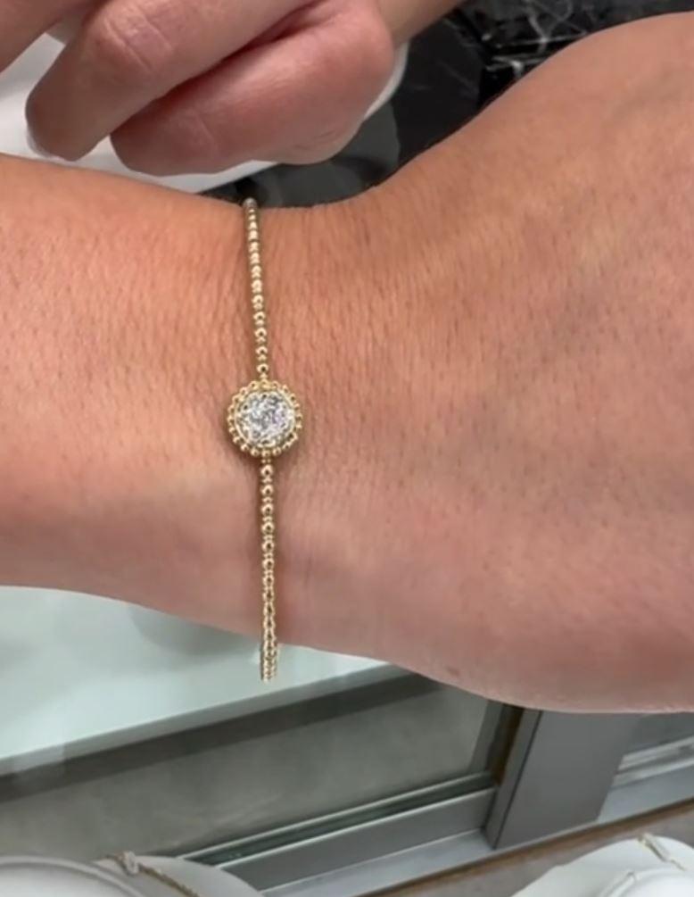 Bracelet en or jaune 14K avec des diamants pesant 0,27 carat au total.