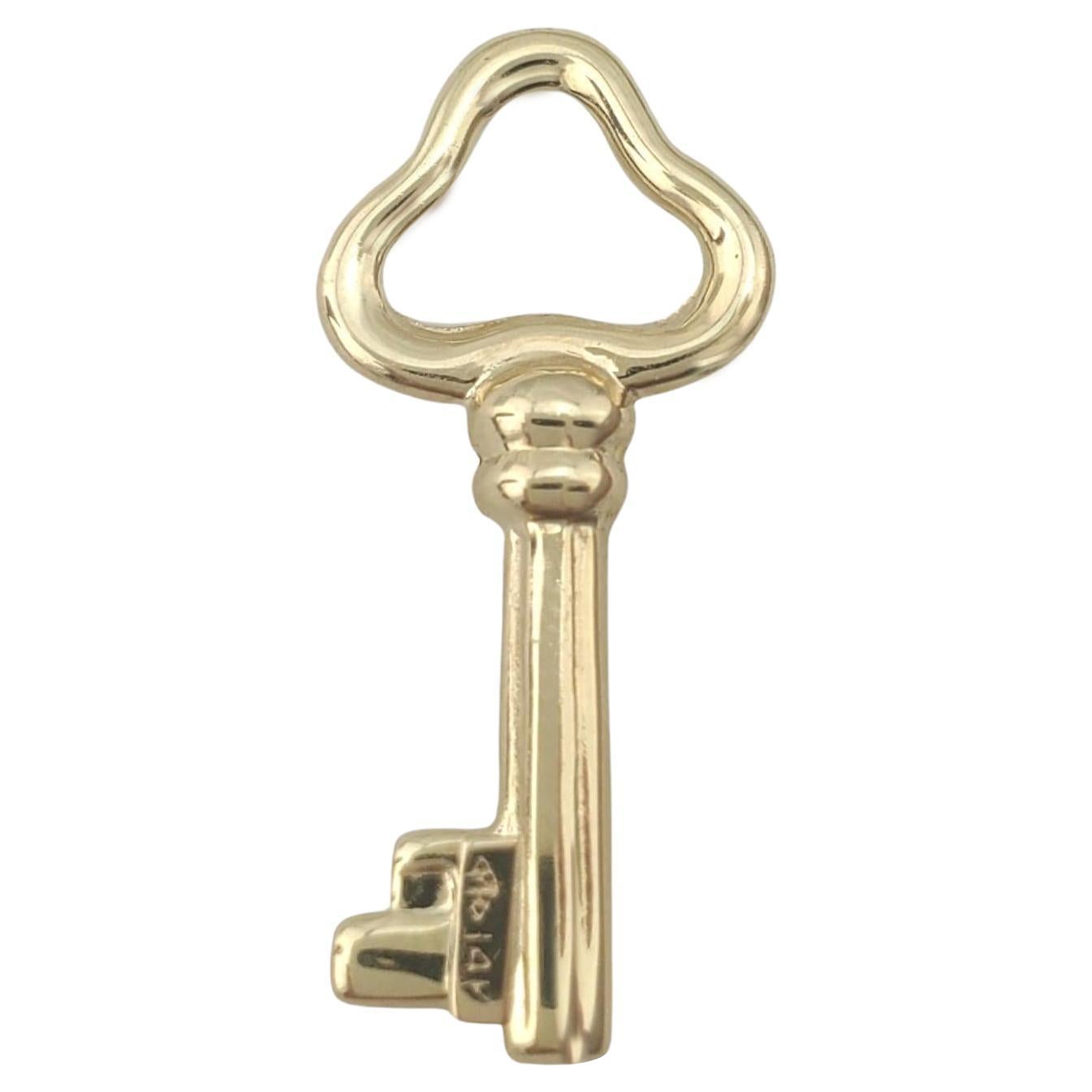 Ciondolo con chiave scheletrica in oro giallo 14K #17743