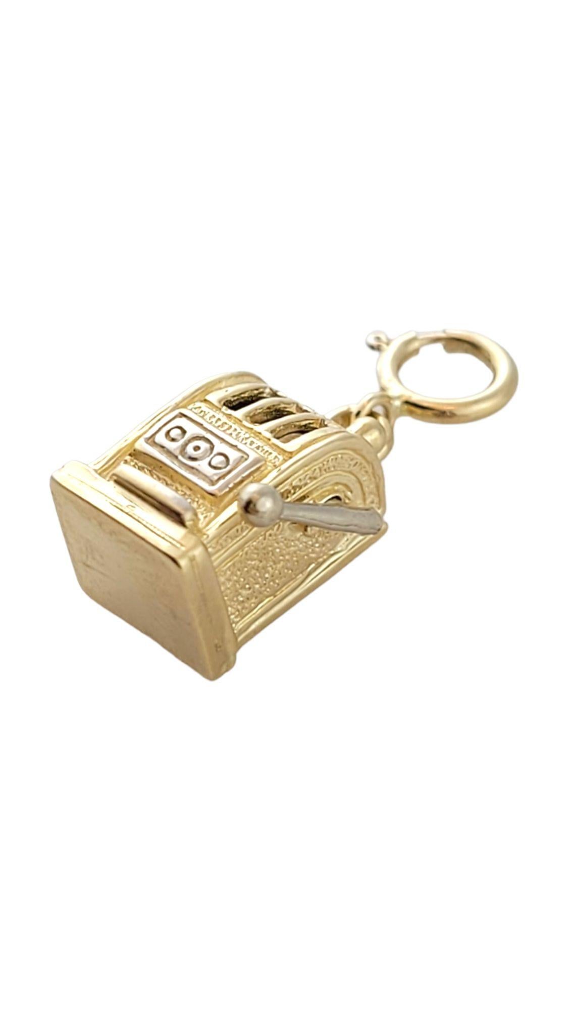 This adorable 14K gold slot machine charm features a moving handle to represent the way a real slot machine works!

Size: 13.8mm X 9.3mm X 7.5mm

Length w/ bail: 21.5mm

Weight: 3.8 g/ 2.4 dwt

Hallmark: 585

Very good condition, professionally