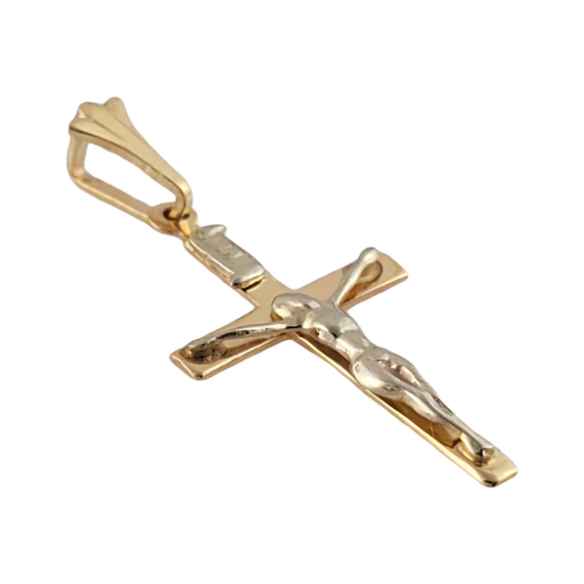 14K Yellow Gold Small Crucifix 

Beautiful vintage 14k yellow gold small crucifix!

Size: 19.23mm X 12.99 mm

Weight:  0.4gr /  0.2 dwt

Hallmark: 14K 

Very good condition, professionally polished.

*Chain not included*

Will come packaged in a