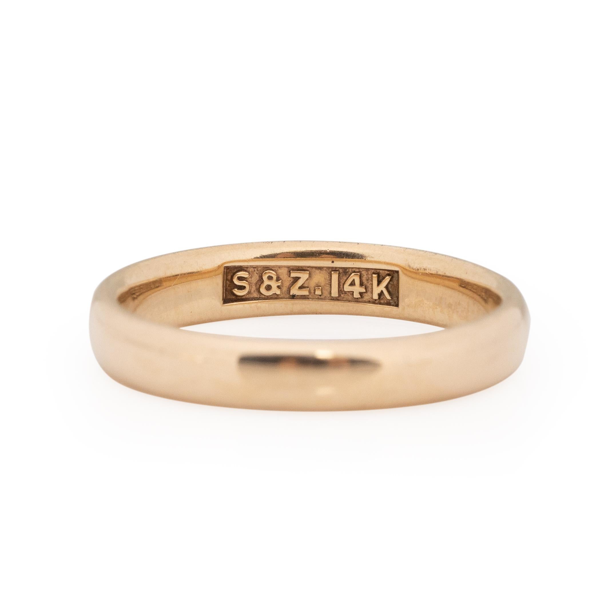 Looking for a classic? This 14K yellow gold band is just that, the sooth mirror like finish and the comfort fit is timeless and perfect in every way. This band would look wonderful on any man or woman, stacked with other vintage bands, paired with a
