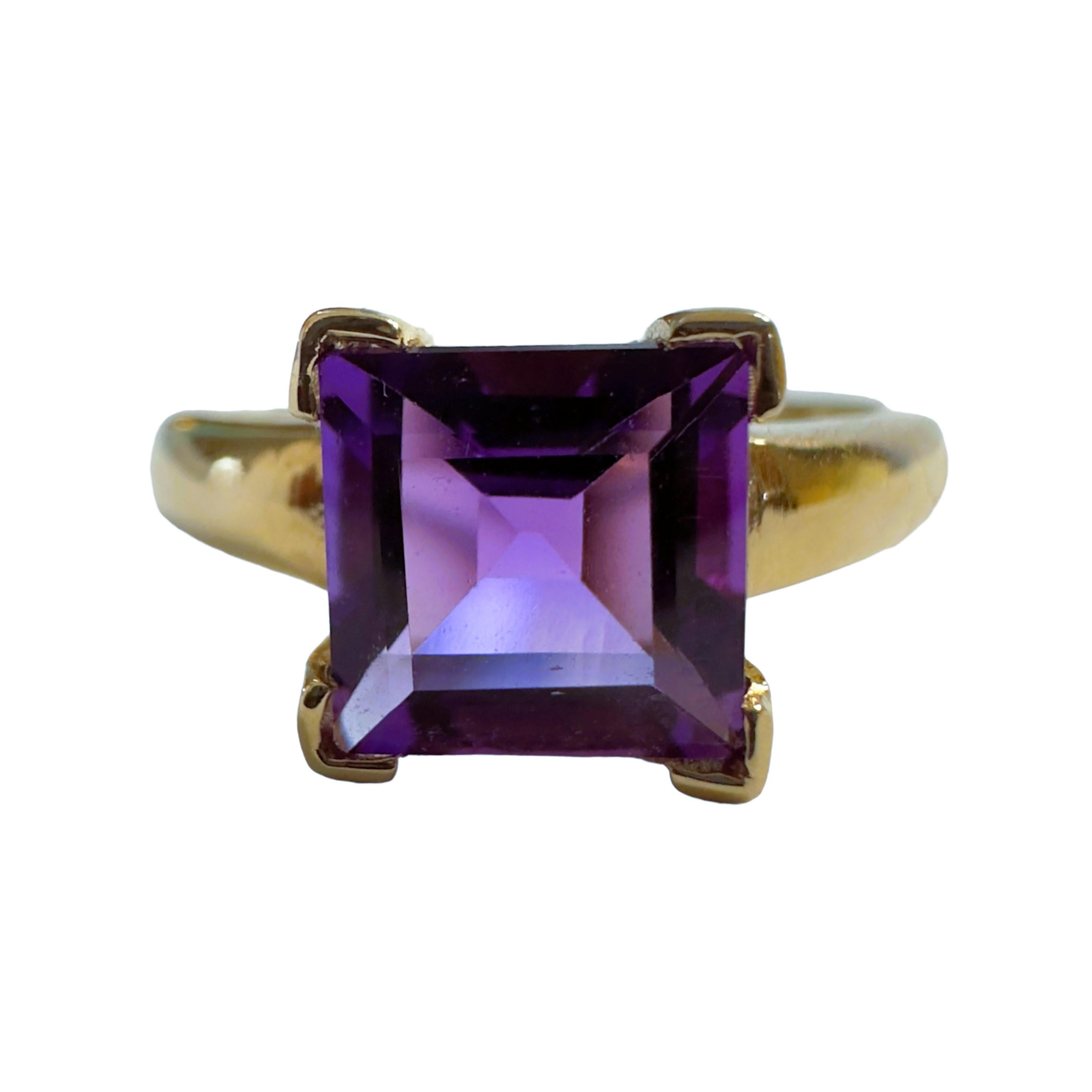 What a gorgeous ring this is!!  It has a beautiful asscher cut amethyst stone. It is a size 6.75.  I just love the simple but classy design it has   It is stamped 